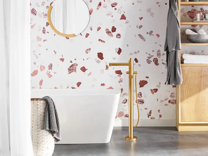 Free standing bath tup with brass faucet and rose pedal wall - Weinstein Plumbing Supply West Chester