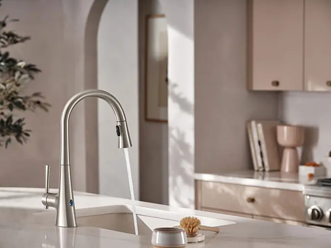 Brushed Stailess steel kitchen faucet with running water - Weinstein Kitchen & Bath Showroom West Chester