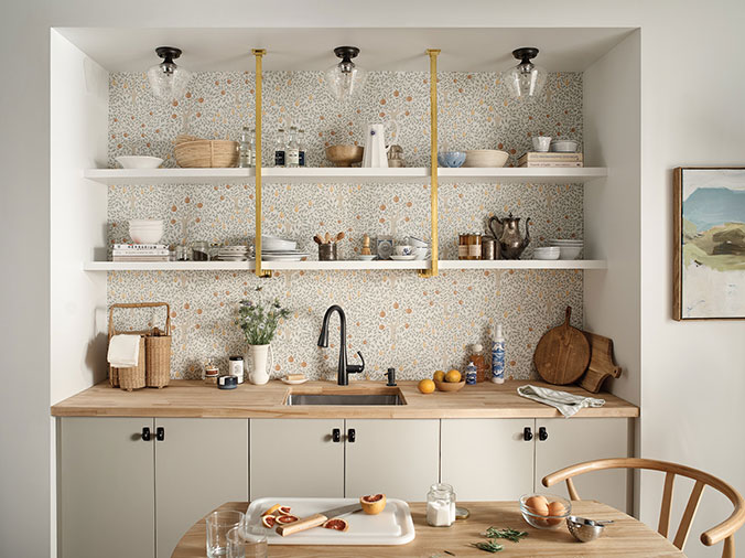 Clean kitchen counter with black sink faucet - Weinstein Kitchen & Bath Showroom West Chester