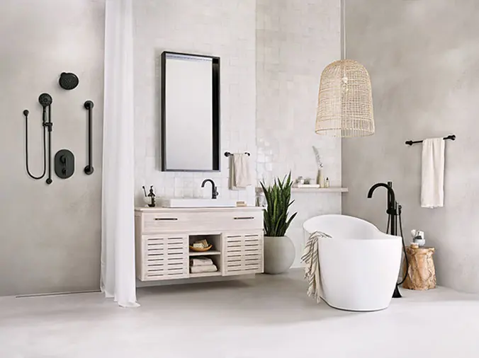 White bathroom with black faucets and fittings - Weinstein Wholesale Plumbing Supply West Chester Pennsylvania