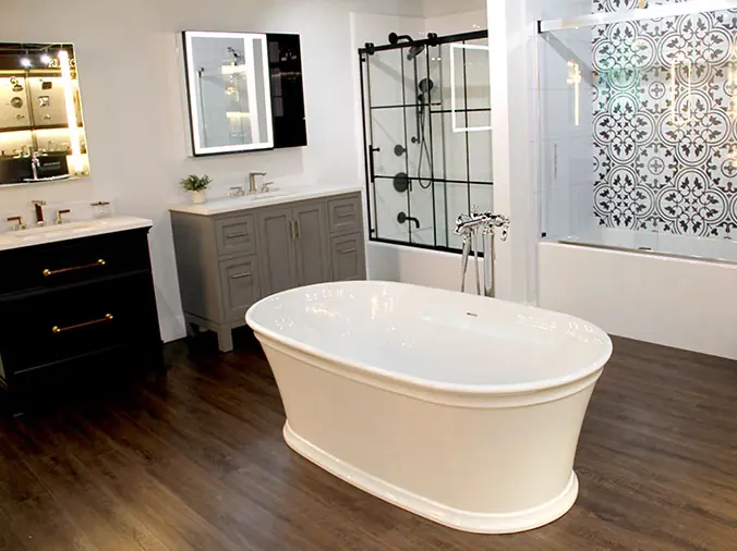 Free standing bathtub, shower doors and bathroom cabinents on display in the Weinstein West Chester Showroom